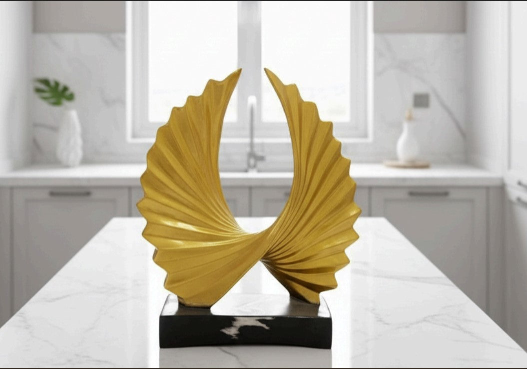 Abstract Golden Sculpture – A Symbol of Creativity, Elegance, and