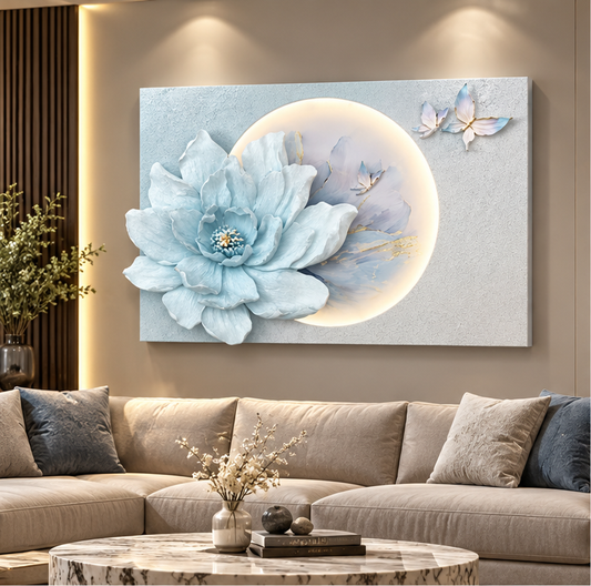 3D blue floral LED wall art with layered petals and butterflies - styled above a living room sofa