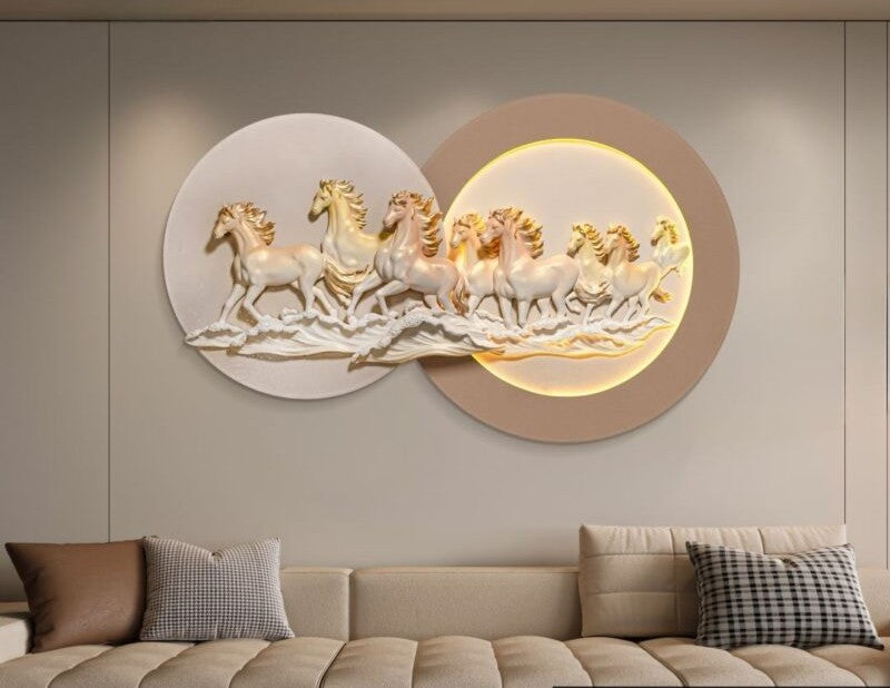 3D Galloping Horses LED Wall Art with warm LED halo, ivory and gold sculpted horses, 80 x 132 cm - twin overlapping circular panels lit view