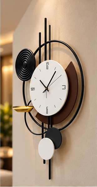 Black spiral and gold dish wall clock with offset black and white circles, 20 x 30 cm - angled view on the wall