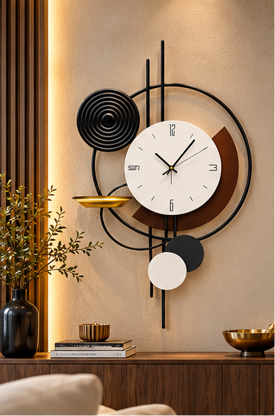 Black spiral and gold dish wall clock with offset black and white circles, 20 x 30 cm - styled above a console table