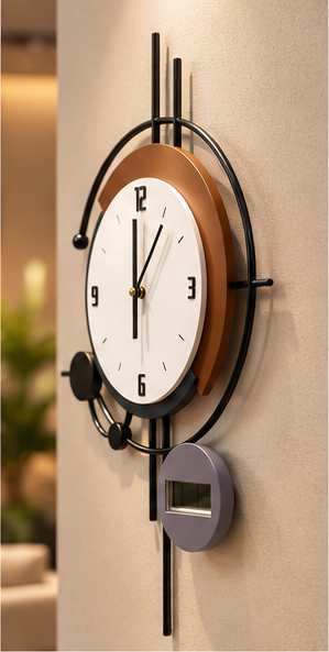 Black ring wall clock with a copper crescent behind the dial and a digital display, 20 x 30 cm - angled view on the wall