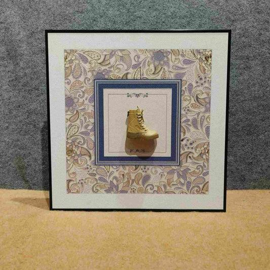 Embossed Boot: Vintage Style Footwear Wall Art