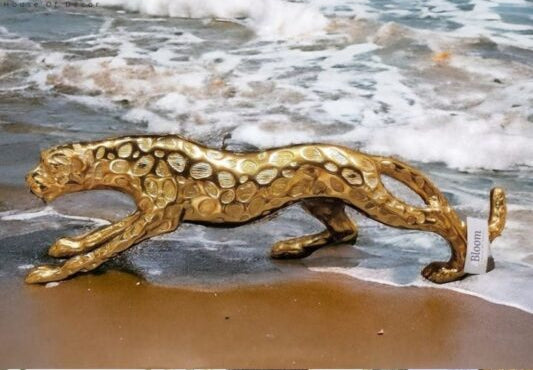 Gilded Hunter: Textured Leopard Sculpture