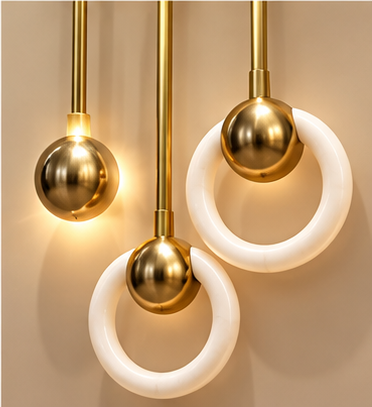 Peacock blossom LED wall art with brass shelf and hanging LED ring pendants, 24 x 52 inch - close-up of the brass spheres and glowing LED rings