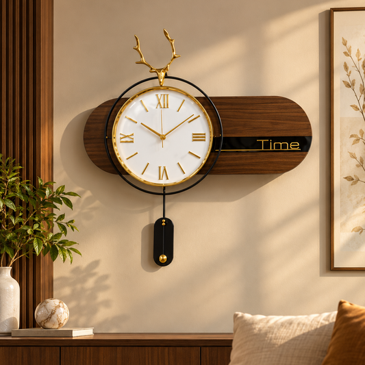 Walnut and gold antler pendulum wall clock with a white Roman dial and black pendulum, 32 x 80 cm